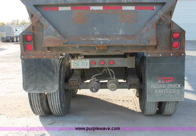 image for item H8418 1998 Travis barrel end dump trailer