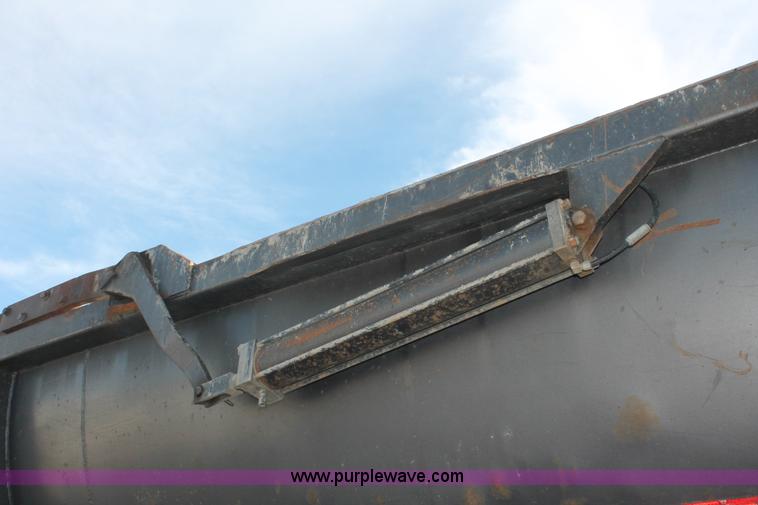 image for item H8418 1998 Travis barrel end dump trailer