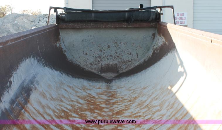 image for item H8418 1998 Travis barrel end dump trailer