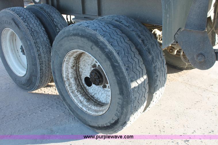 image for item H8418 1998 Travis barrel end dump trailer