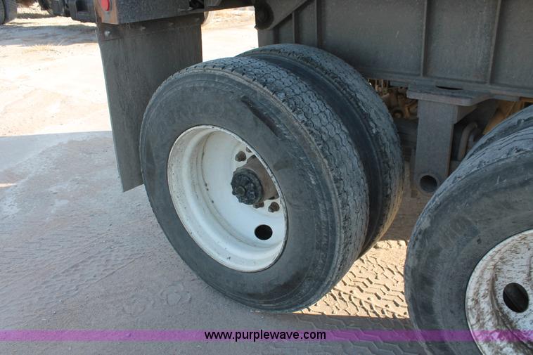 image for item H8418 1998 Travis barrel end dump trailer