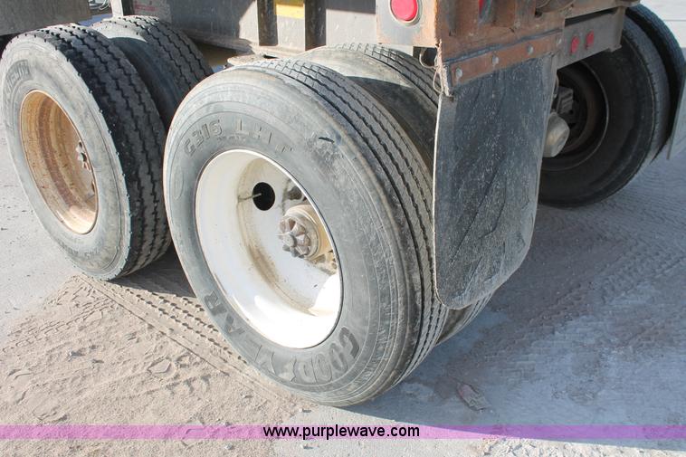 image for item H8418 1998 Travis barrel end dump trailer