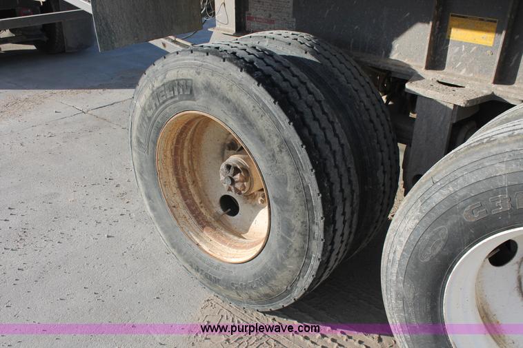 image for item H8418 1998 Travis barrel end dump trailer