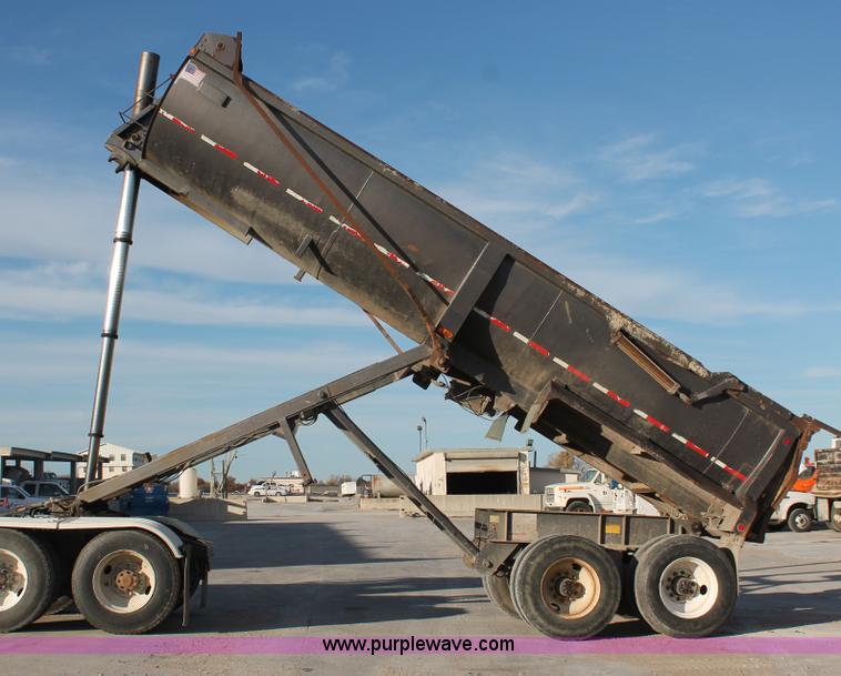 image for item H8418 1998 Travis barrel end dump trailer