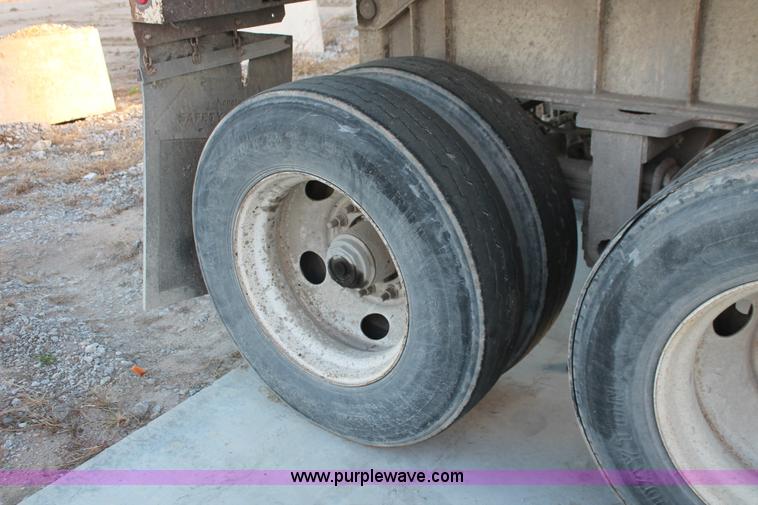 image for item H8420 1998 Travis barrel end dump trailer