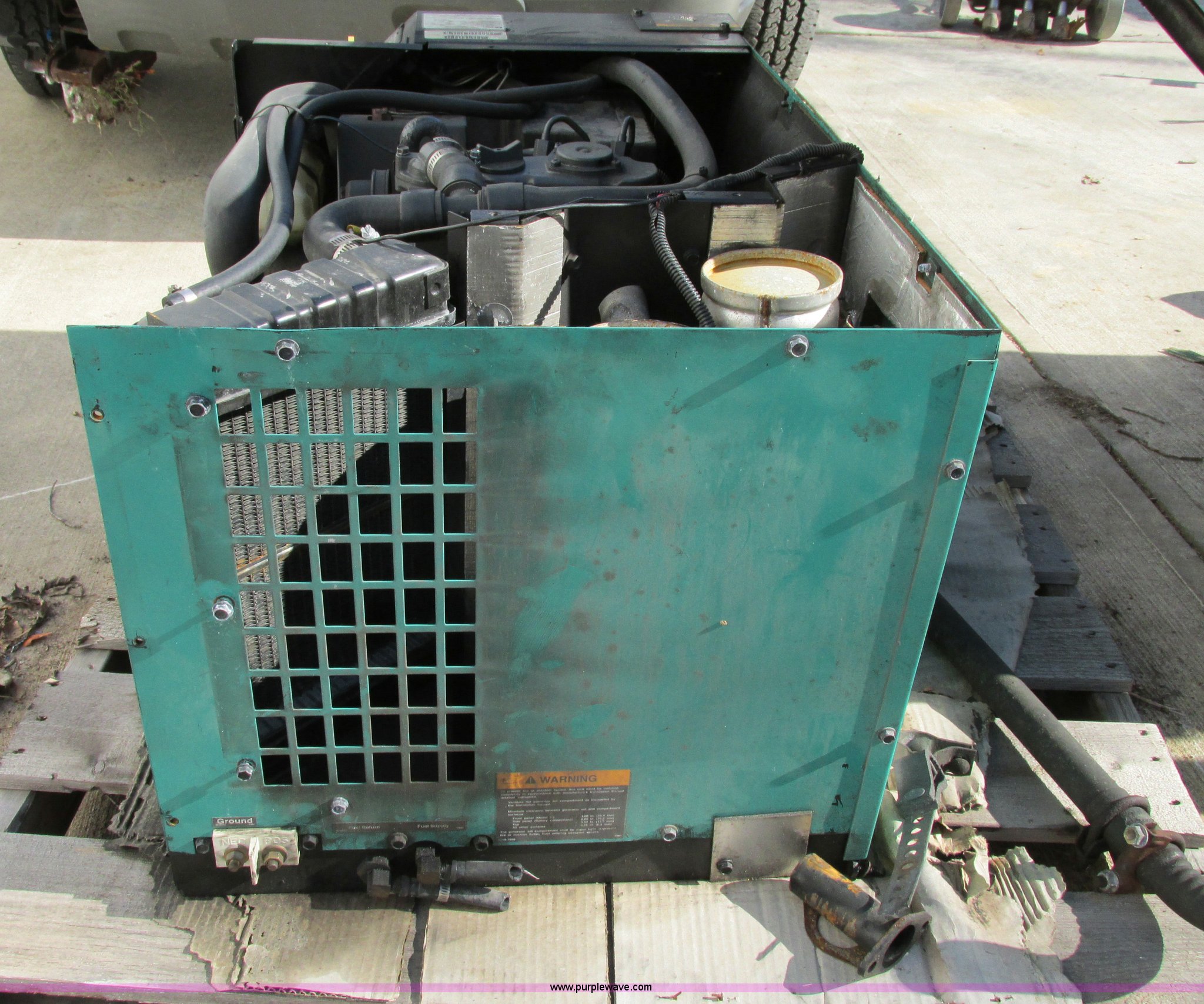 Onan Quiet 5500 generator in Sugar Creek, MO Item F5397 sold Purple