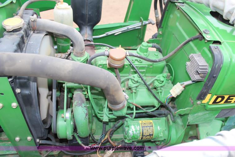 image for item C1680 1985 John Deere 750 MFWD tractor