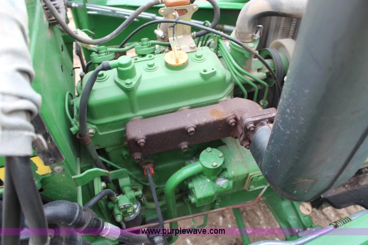 image for item C1680 1985 John Deere 750 MFWD tractor