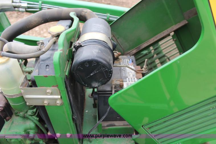 image for item C1680 1985 John Deere 750 MFWD tractor