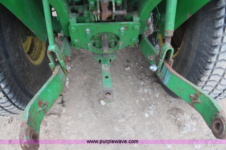 image for item C1680 1985 John Deere 750 MFWD tractor