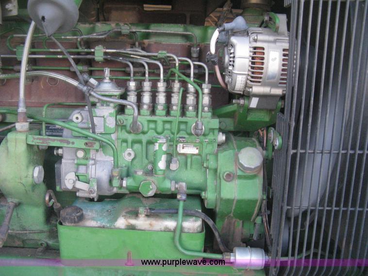 image for item H4272 1989 John Deere 4955 MFWD tractor