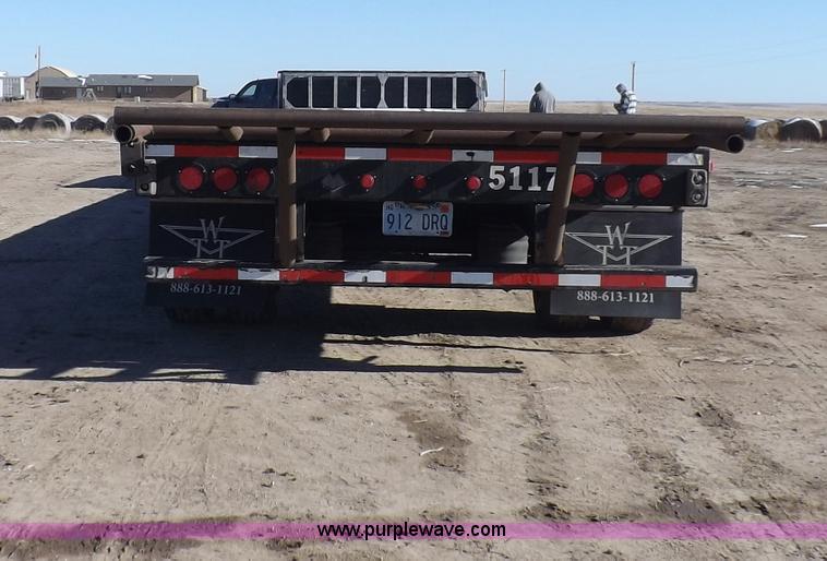 image for item I9223 2007 Transcraft step deck trailer