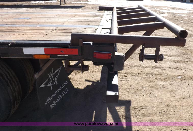 image for item I9223 2007 Transcraft step deck trailer