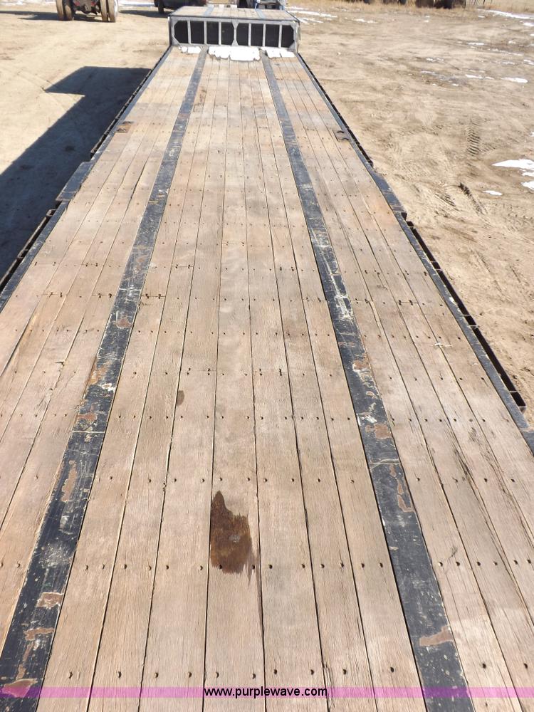 image for item I9223 2007 Transcraft step deck trailer