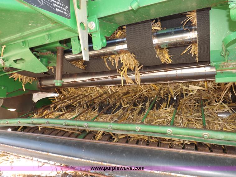 image for item I9237 2010 John Deere 568 round baler