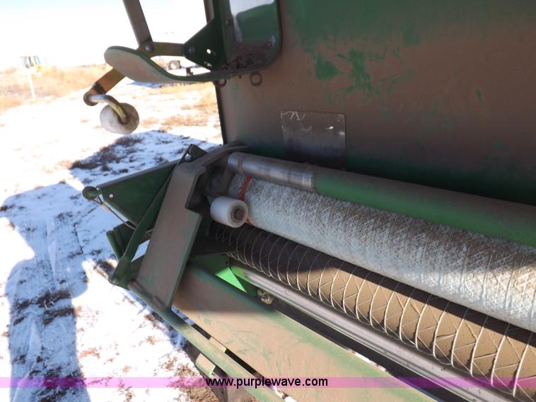 image for item I9237 2010 John Deere 568 round baler