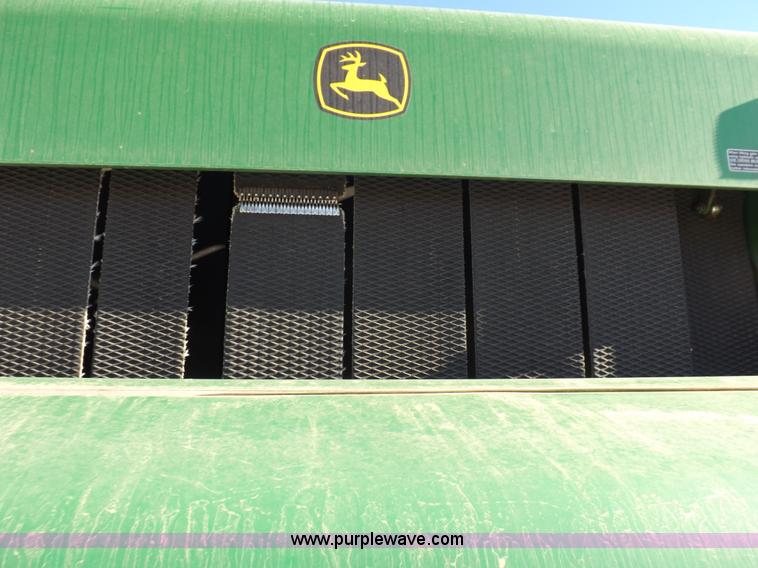 image for item I9237 2010 John Deere 568 round baler