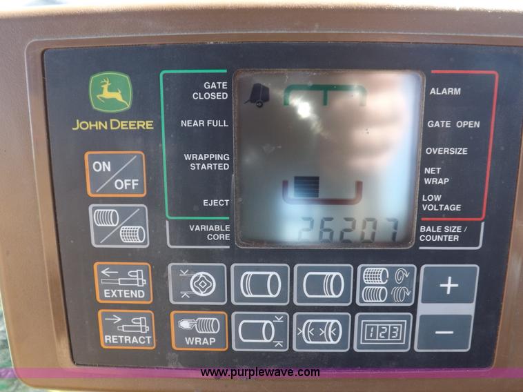 image for item I9237 2010 John Deere 568 round baler