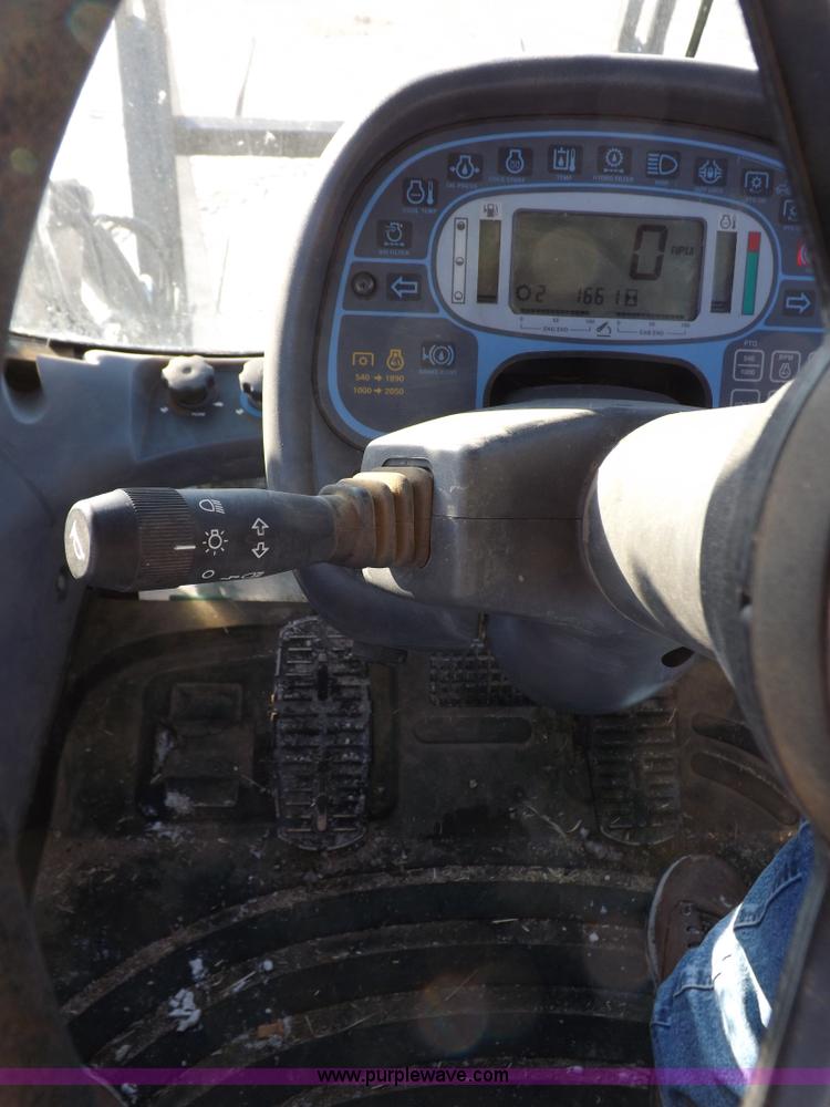 image for item I9240 2005 New Holland TV145 MFWD bi-directional tractor