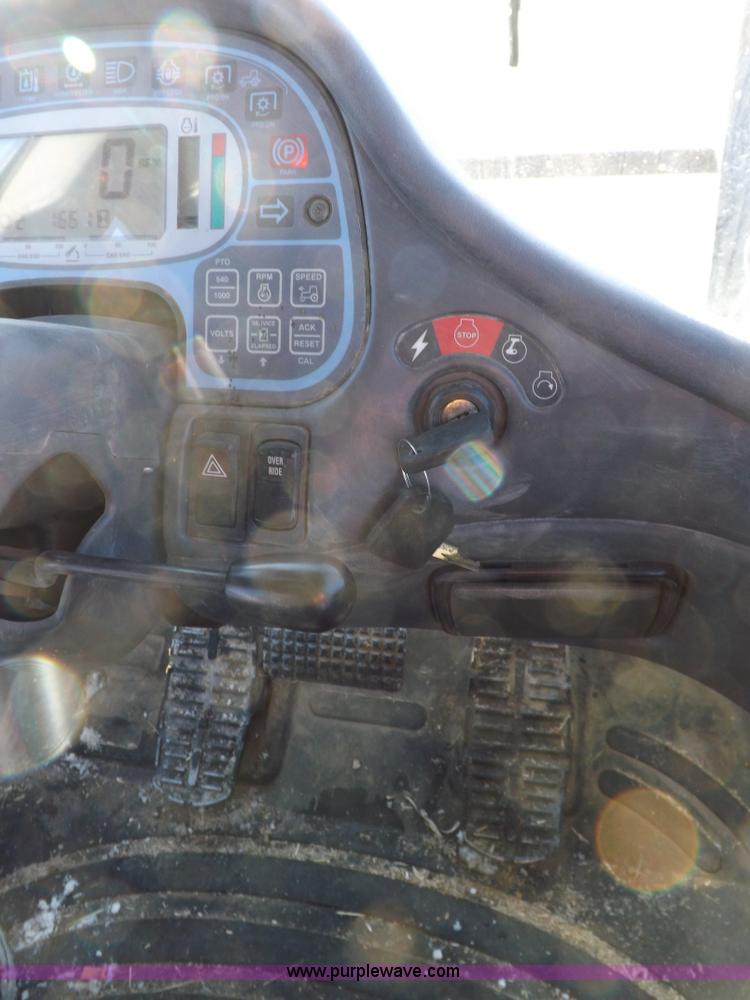 image for item I9240 2005 New Holland TV145 MFWD bi-directional tractor