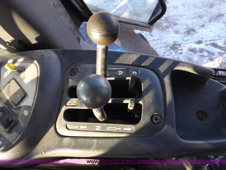 image for item I9240 2005 New Holland TV145 MFWD bi-directional tractor