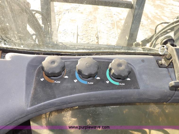 image for item I9240 2005 New Holland TV145 MFWD bi-directional tractor