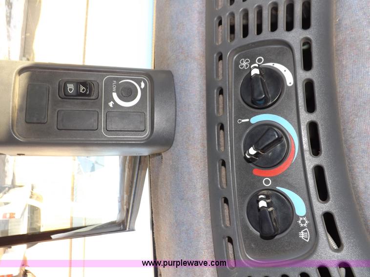 image for item I9240 2005 New Holland TV145 MFWD bi-directional tractor