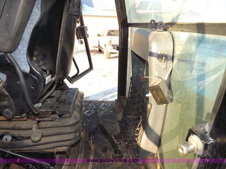 image for item I9240 2005 New Holland TV145 MFWD bi-directional tractor