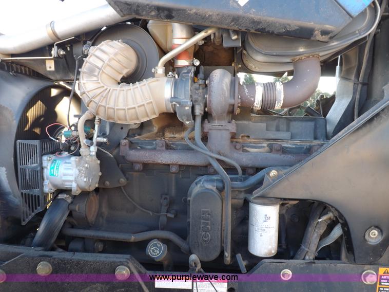 image for item I9240 2005 New Holland TV145 MFWD bi-directional tractor