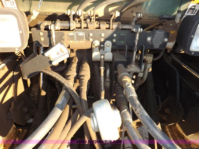 image for item I9240 2005 New Holland TV145 MFWD bi-directional tractor