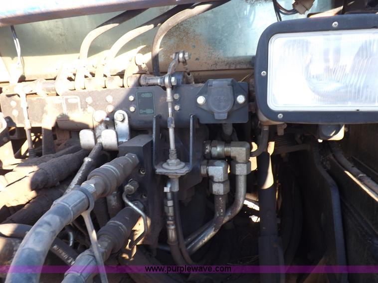 image for item I9240 2005 New Holland TV145 MFWD bi-directional tractor