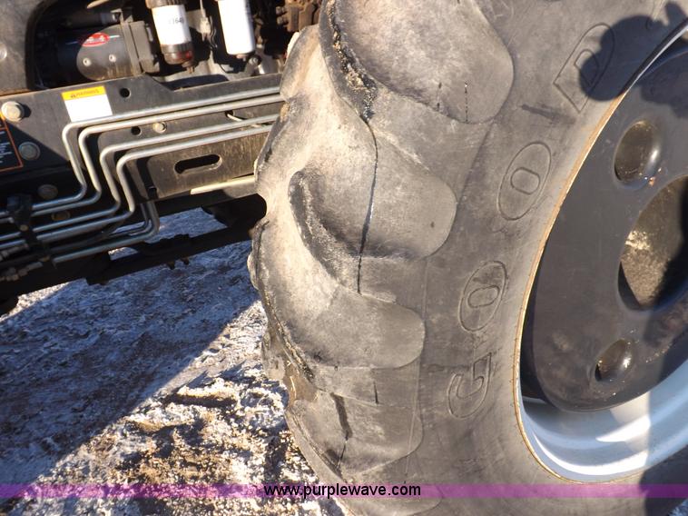 image for item I9240 2005 New Holland TV145 MFWD bi-directional tractor