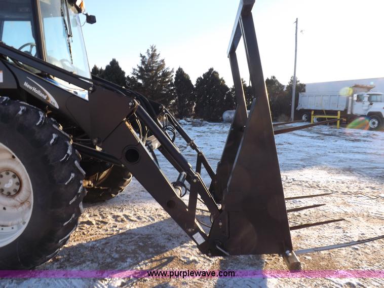 image for item I9240 2005 New Holland TV145 MFWD bi-directional tractor