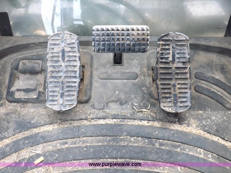 image for item I9240 2005 New Holland TV145 MFWD bi-directional tractor