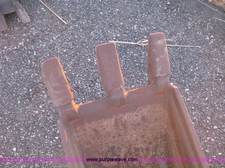 image for item AX9541 Caterpillar three tooth pin-on trench bucket