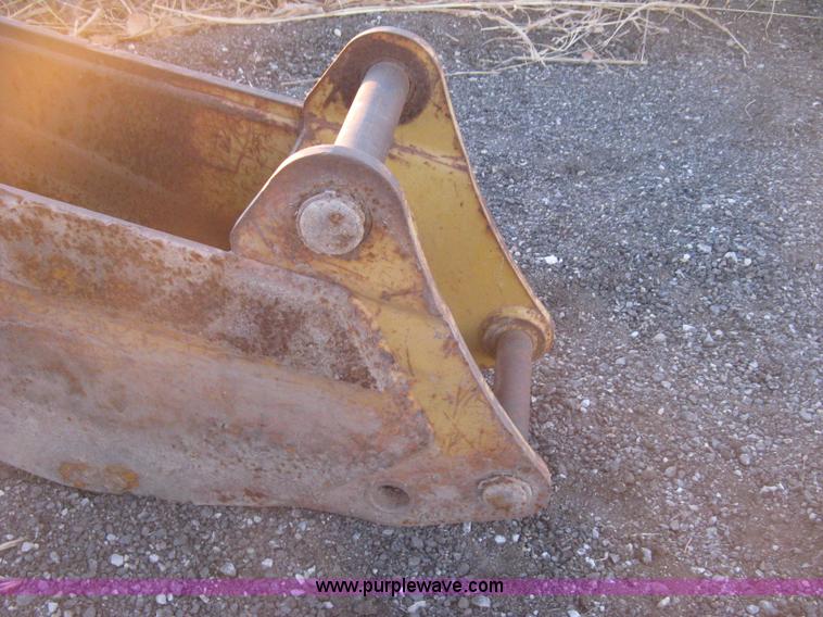 image for item AX9541 Caterpillar three tooth pin-on trench bucket