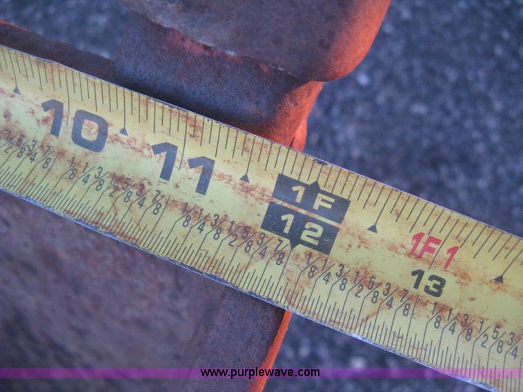 image for item AX9541 Caterpillar three tooth pin-on trench bucket