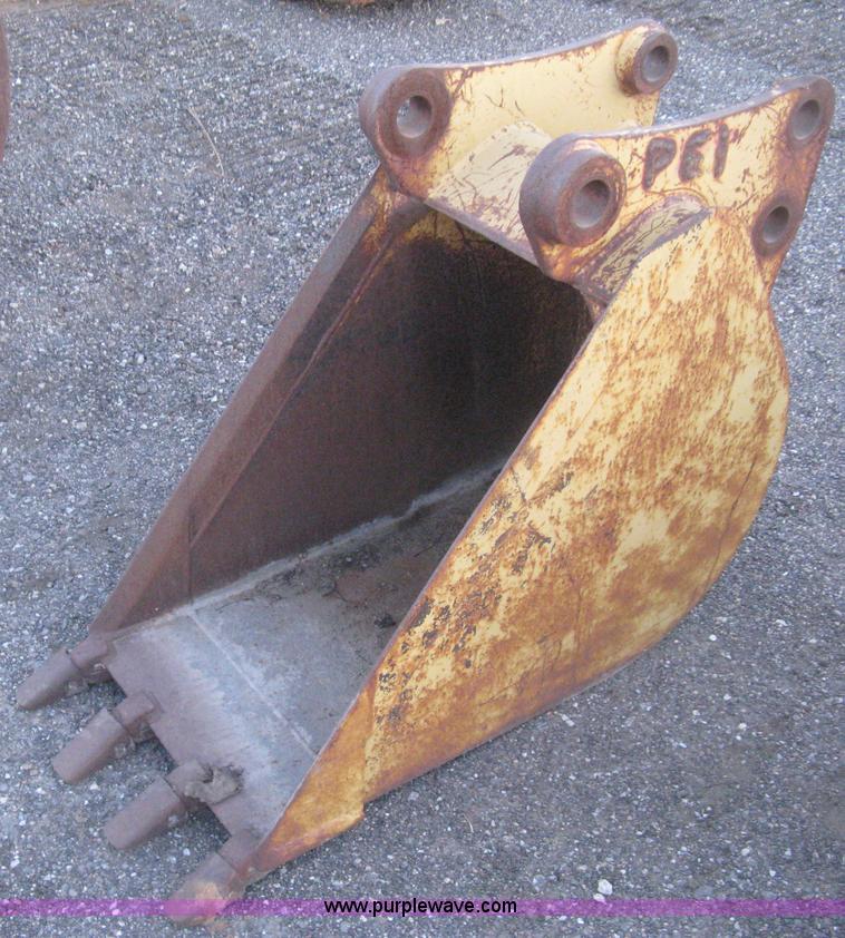 image for item AX9544 Caterpillar four tooth pin-on trench bucket