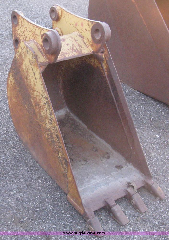 image for item AX9544 Caterpillar four tooth pin-on trench bucket