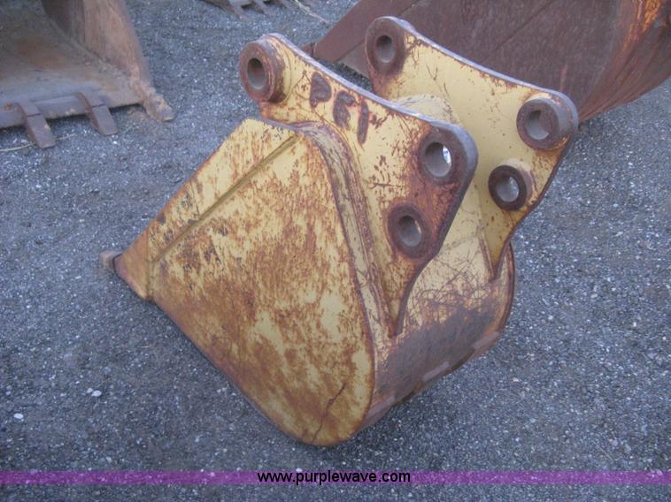 image for item AX9544 Caterpillar four tooth pin-on trench bucket