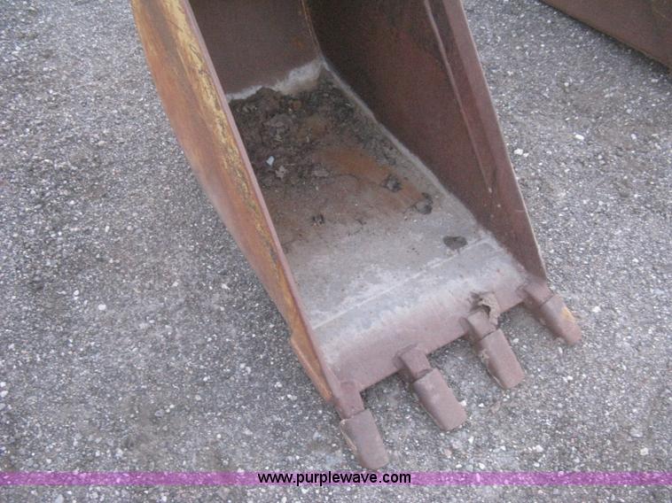 image for item AX9544 Caterpillar four tooth pin-on trench bucket
