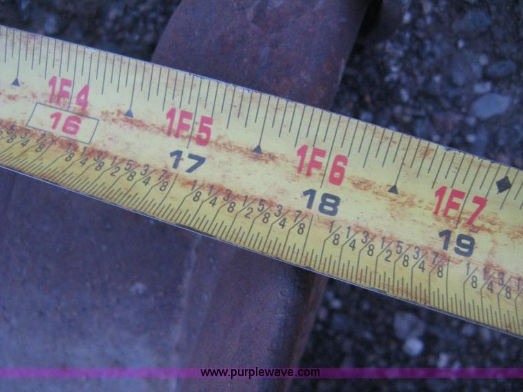 image for item AX9544 Caterpillar four tooth pin-on trench bucket