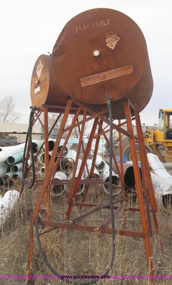 image for item AX9551 (2) gravity flow fuel tanks on stands