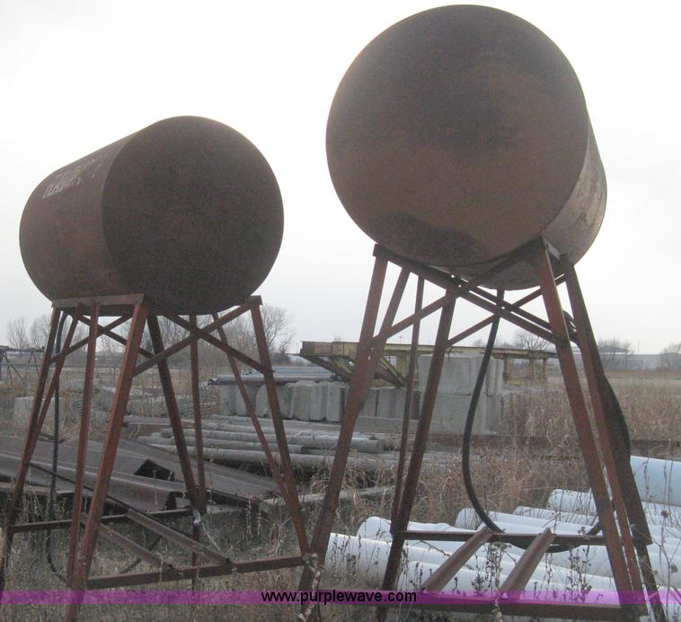 image for item AX9551 (2) gravity flow fuel tanks on stands