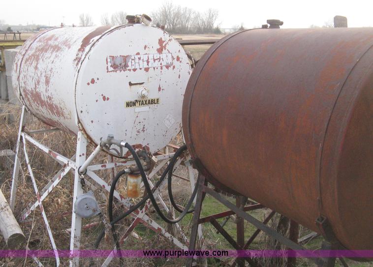 image for item AX9552 (2) gravity flow fuel tanks on stands
