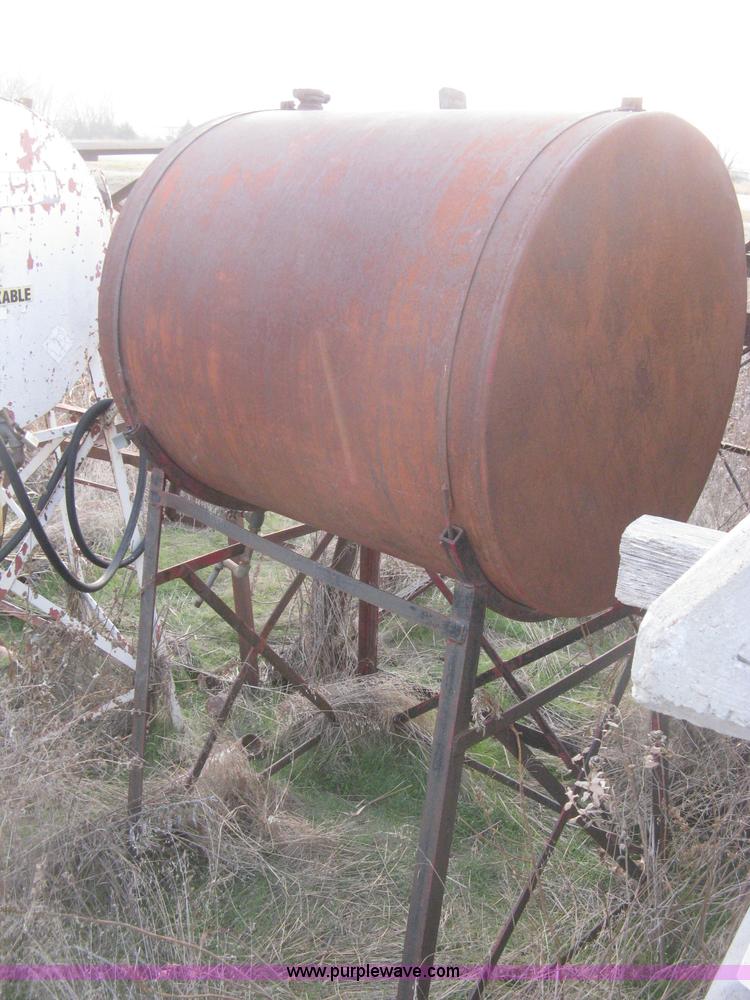 image for item AX9552 (2) gravity flow fuel tanks on stands