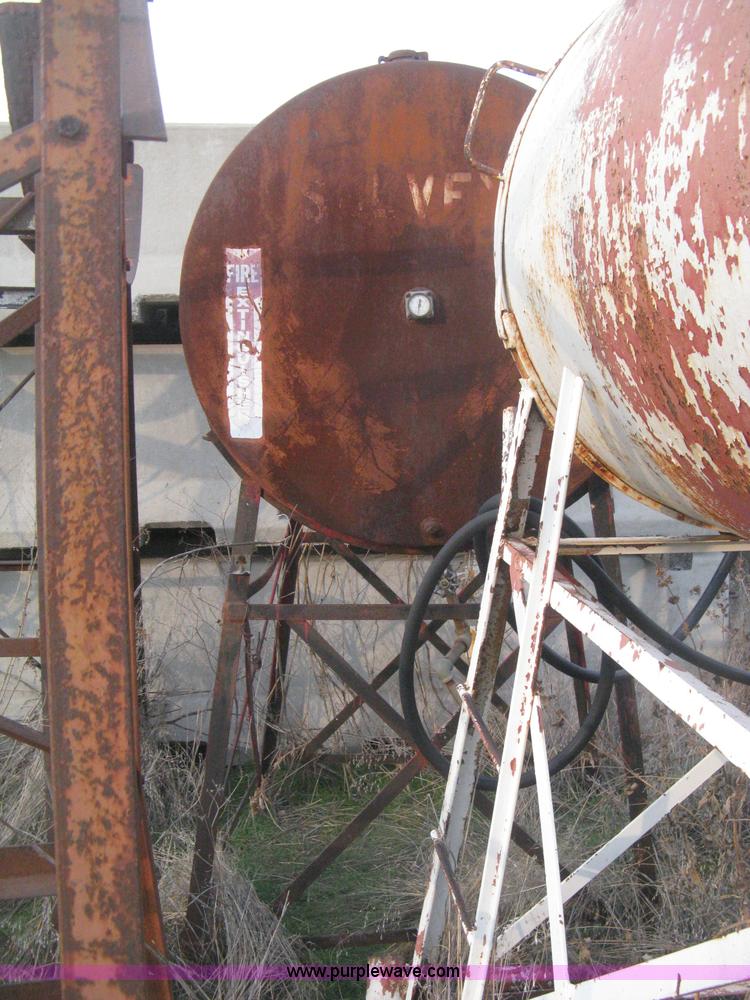 image for item AX9552 (2) gravity flow fuel tanks on stands