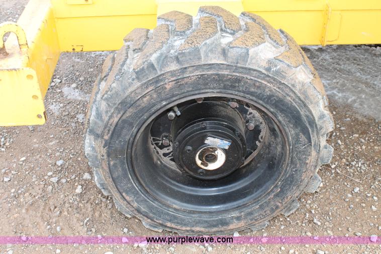 image for item C3641 2002 Haulotte HS4388RT scissor lift