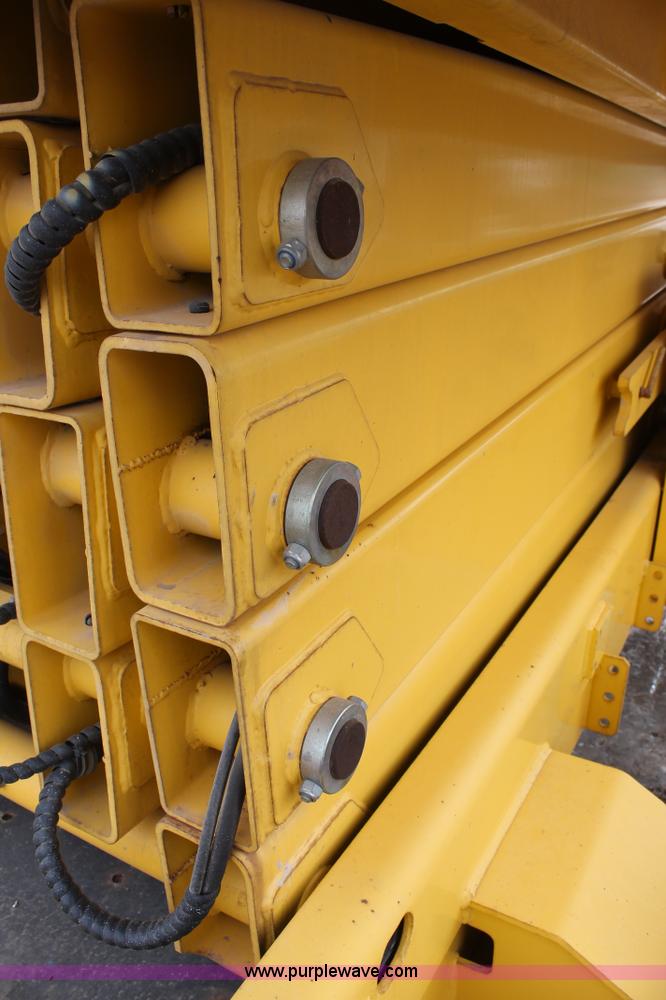 image for item C3641 2002 Haulotte HS4388RT scissor lift