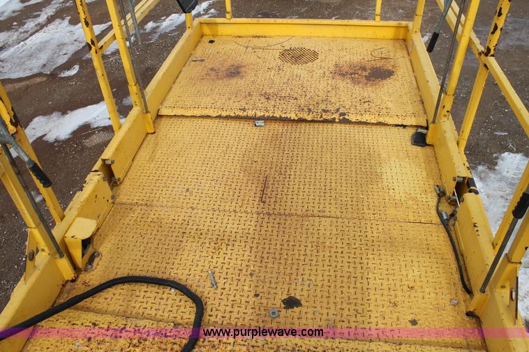 image for item C3641 2002 Haulotte HS4388RT scissor lift